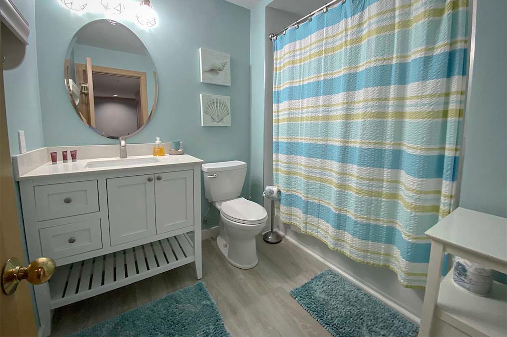 Shared full shower/tub combo bathroom