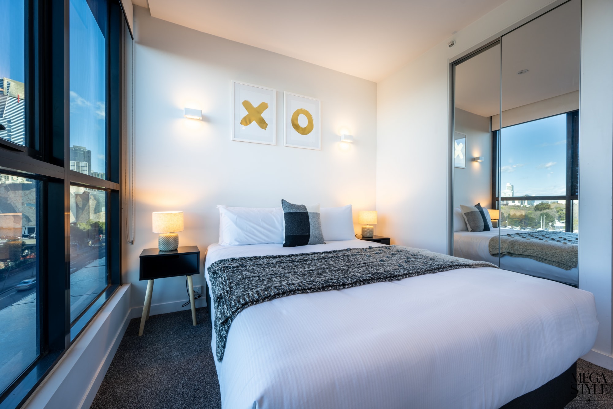 Enjoy the views from the second bedroom with floor to ceiling windows