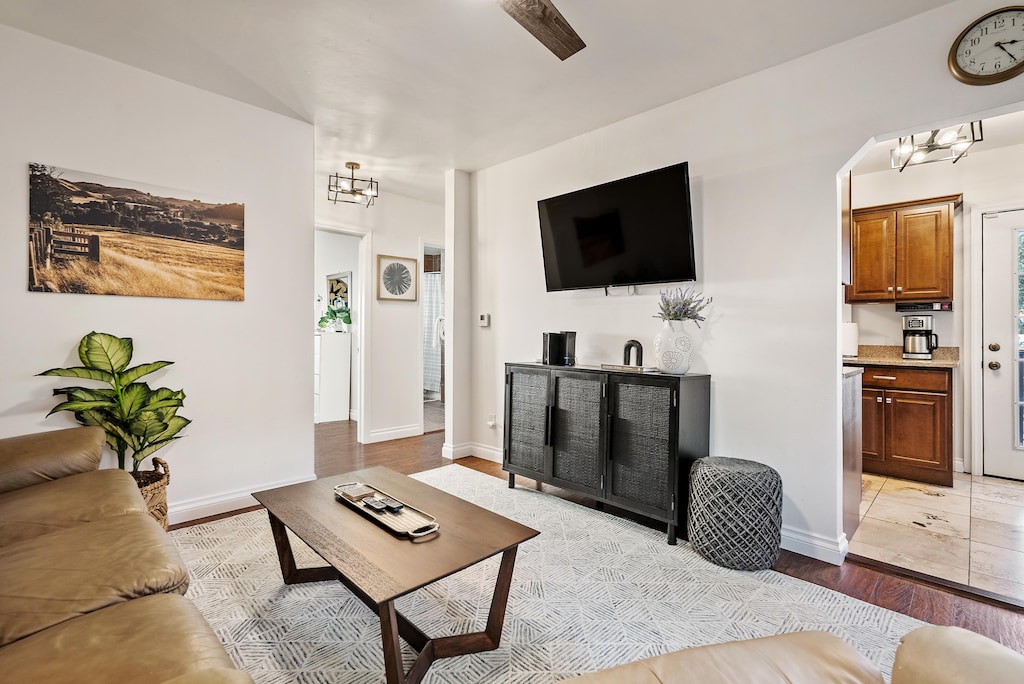 Living Room with Leather Couches and a Flatscreen TV