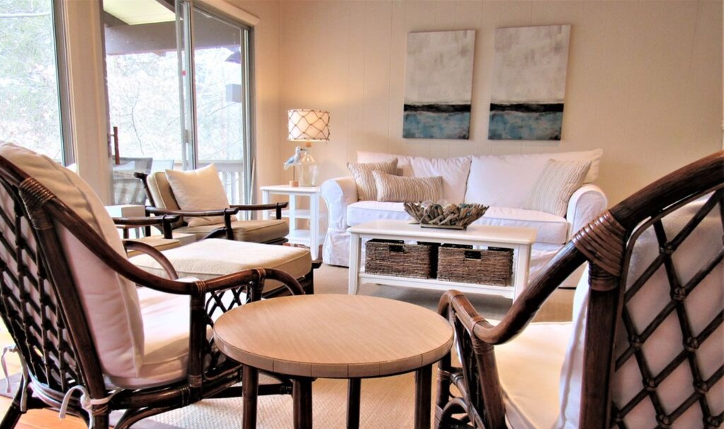 Designed as a lakeside retreat, this three bedroom two bath bungalow offers two floors of sunny open living space.