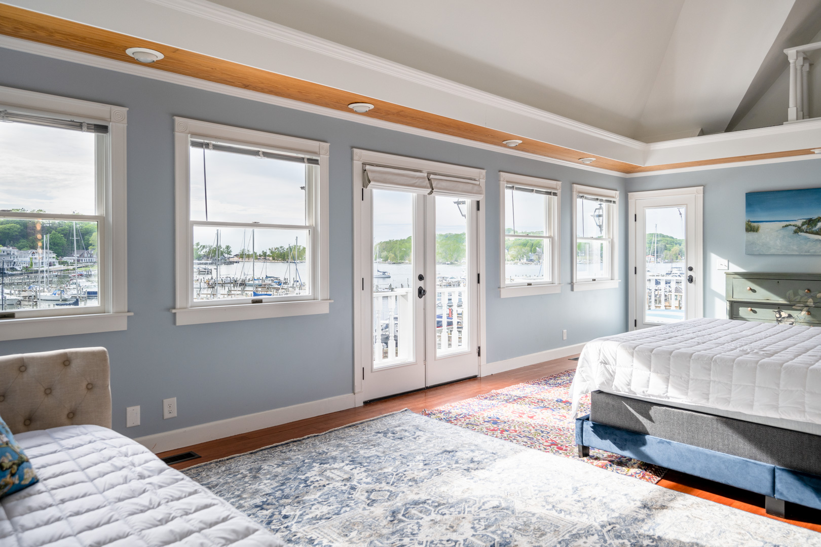 Step out the french doors to your own private deck and enjoy your morning coffee while watching the boats travel to and from Lake Michigan along the channel.