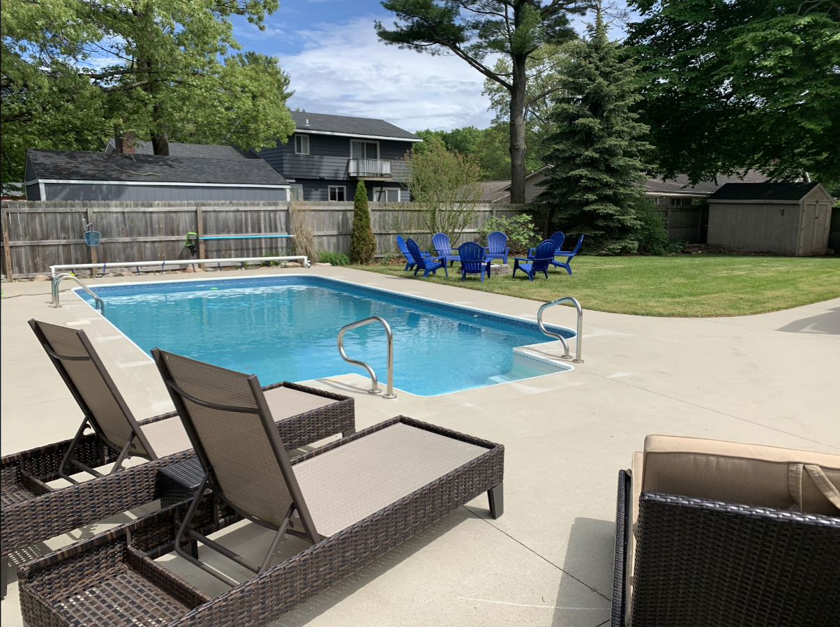 Enjoy the home’s private backyard pool and hot tub along with the perfect patio area for outdoor dining.