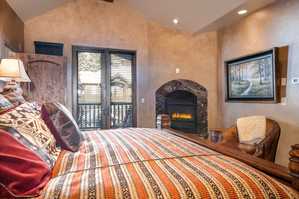 Fall asleep to the warm fire | King Bed