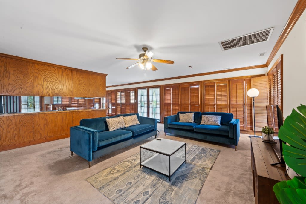 Spacious bright living room with smart tv