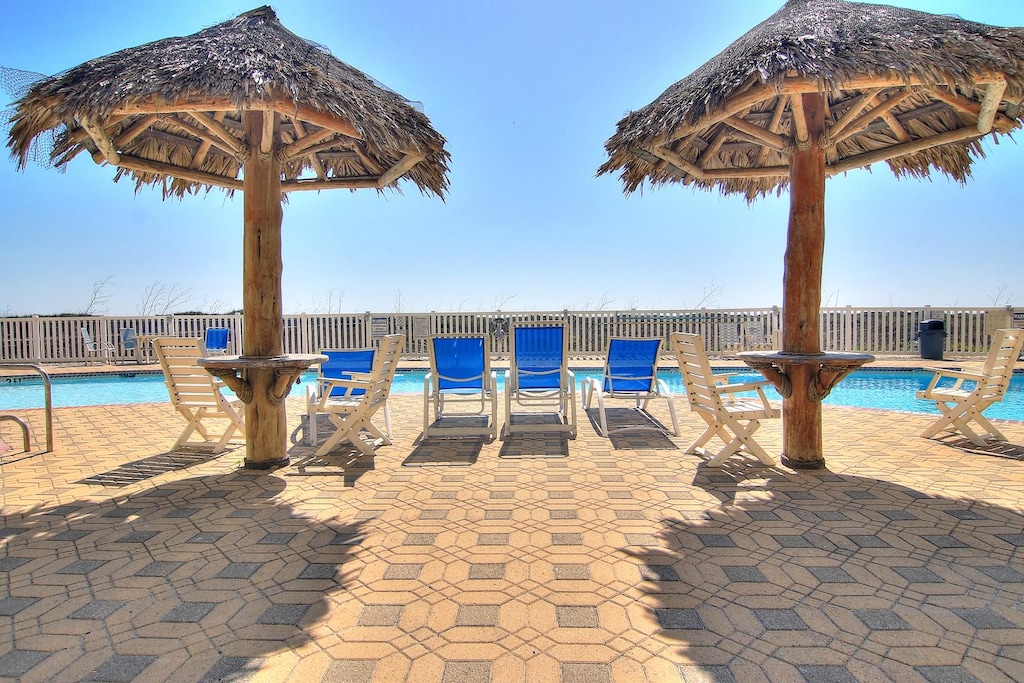 Relax at Grand Caribbean's community pool