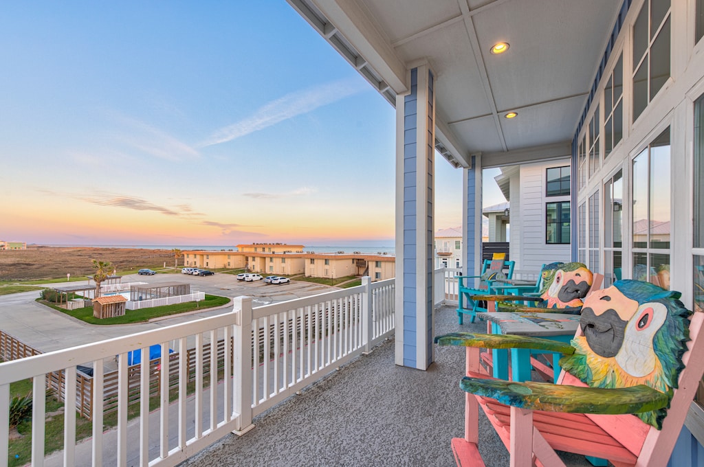 Outdoors. From Sunrise to sunset, the deck views are stunning!