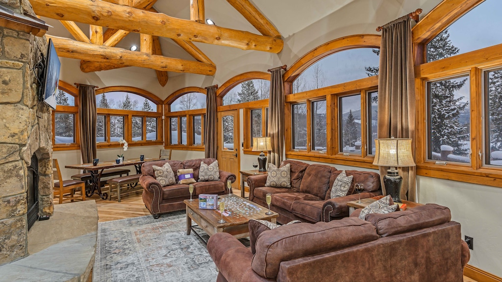 Enjoy the views from the cozy great room, with access to hot tub balcony