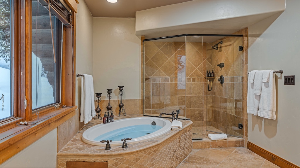 Bedroom 1, Upper Level - Primary king ensuite with soaking tub and shower