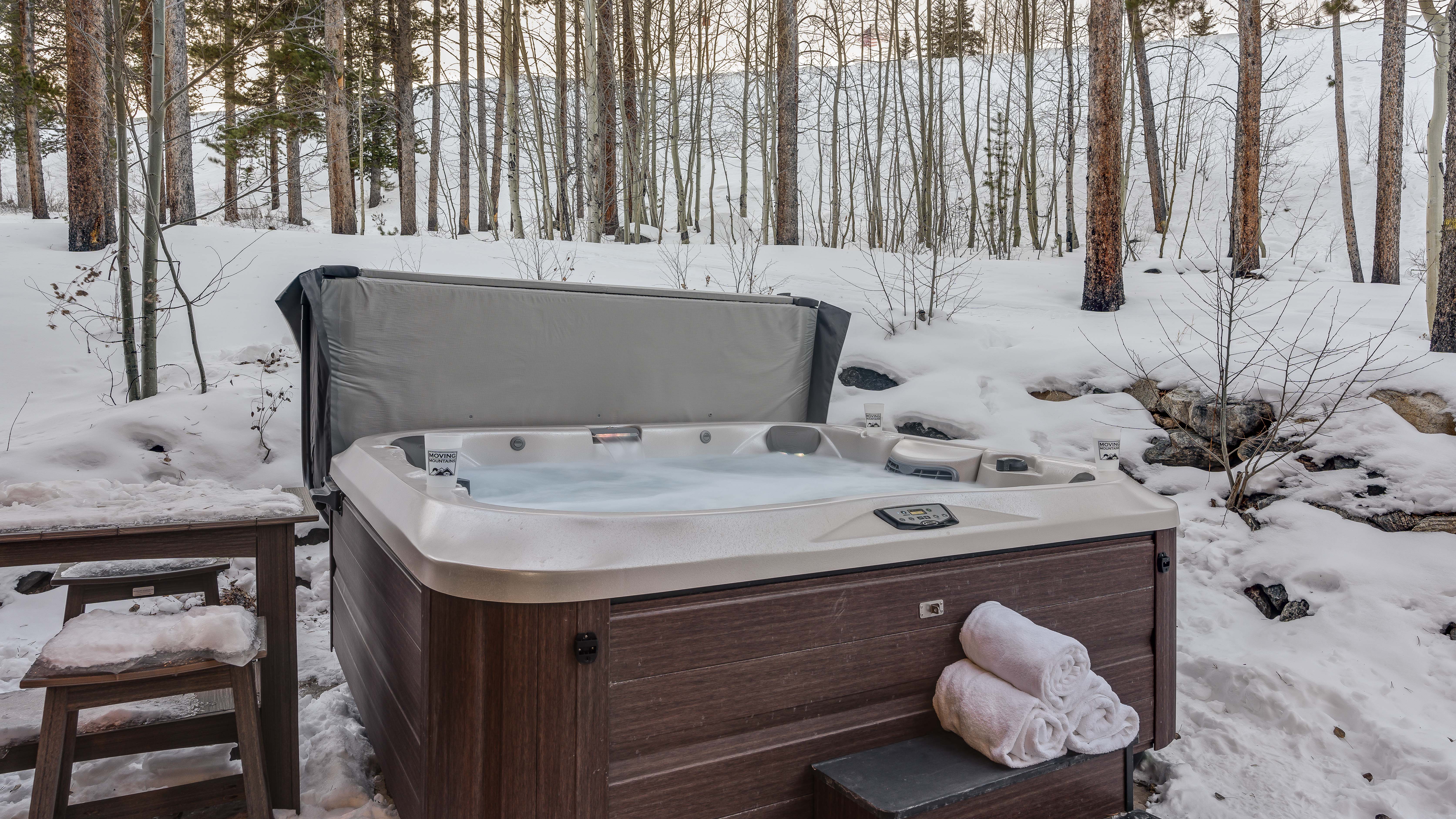 New hot tub with luxury patio furniture