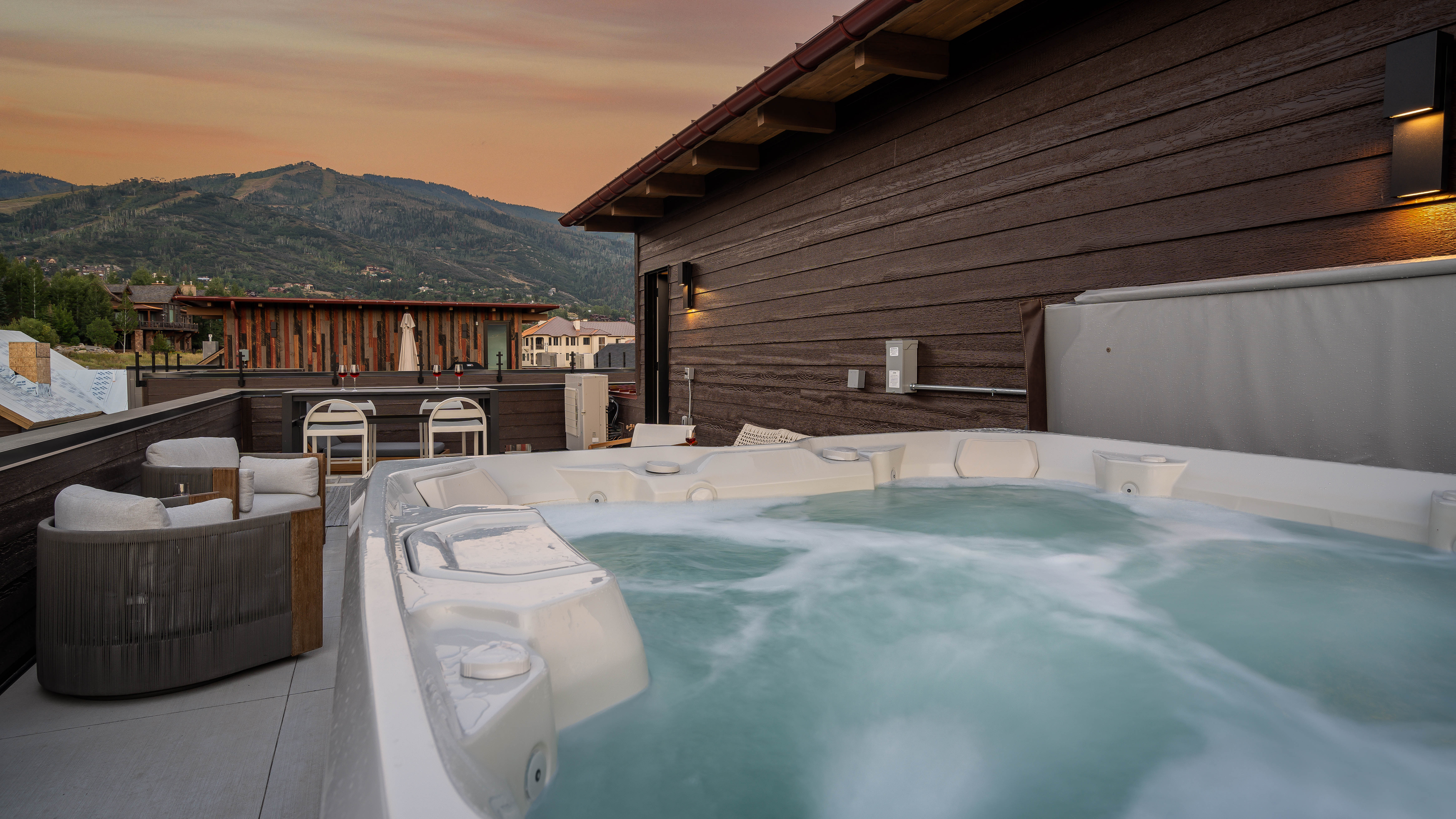 Rooftop patio hot tub facing Steamboat Ski Resort