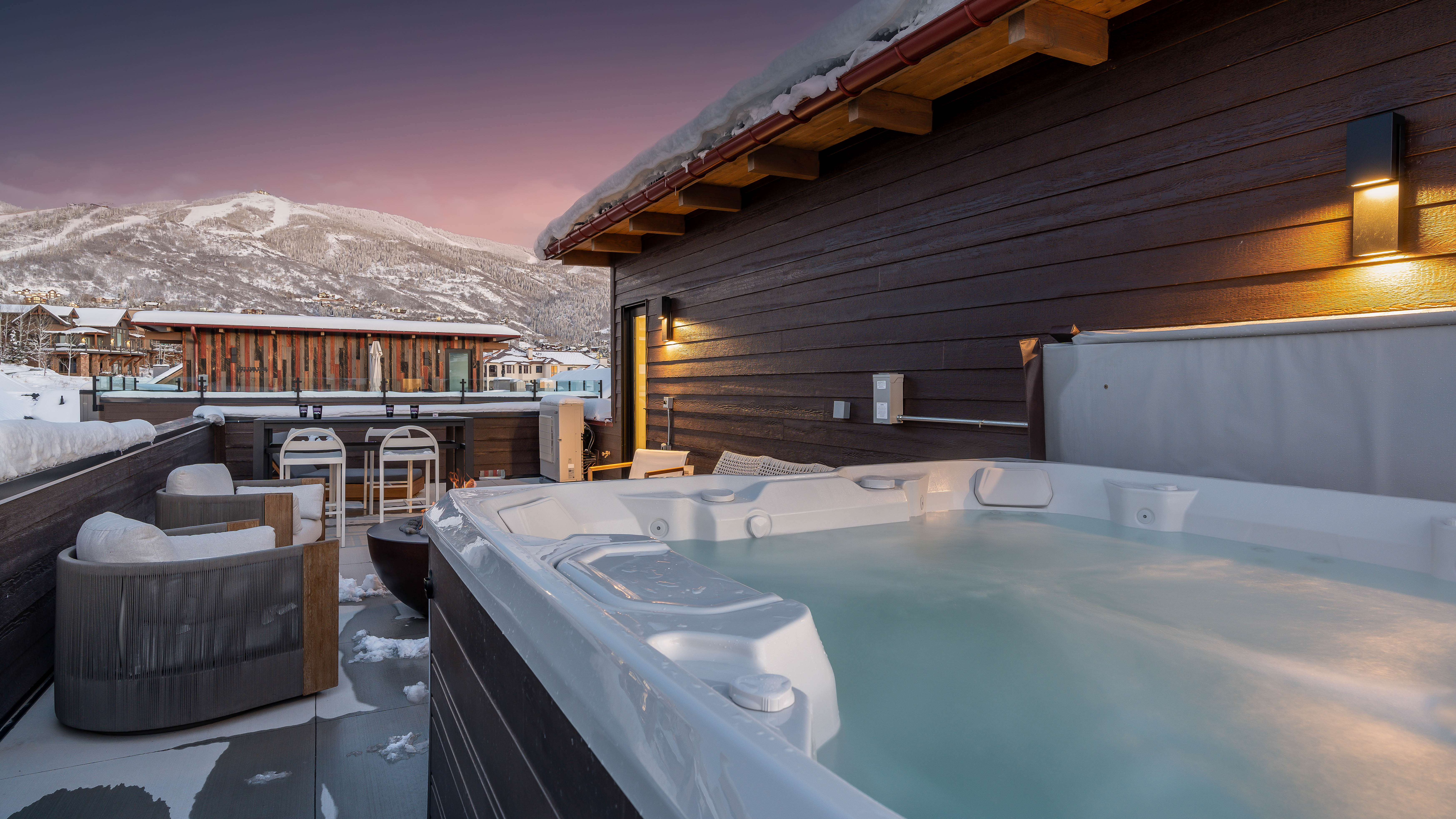 Hot tub with snowy Steamboat Resort