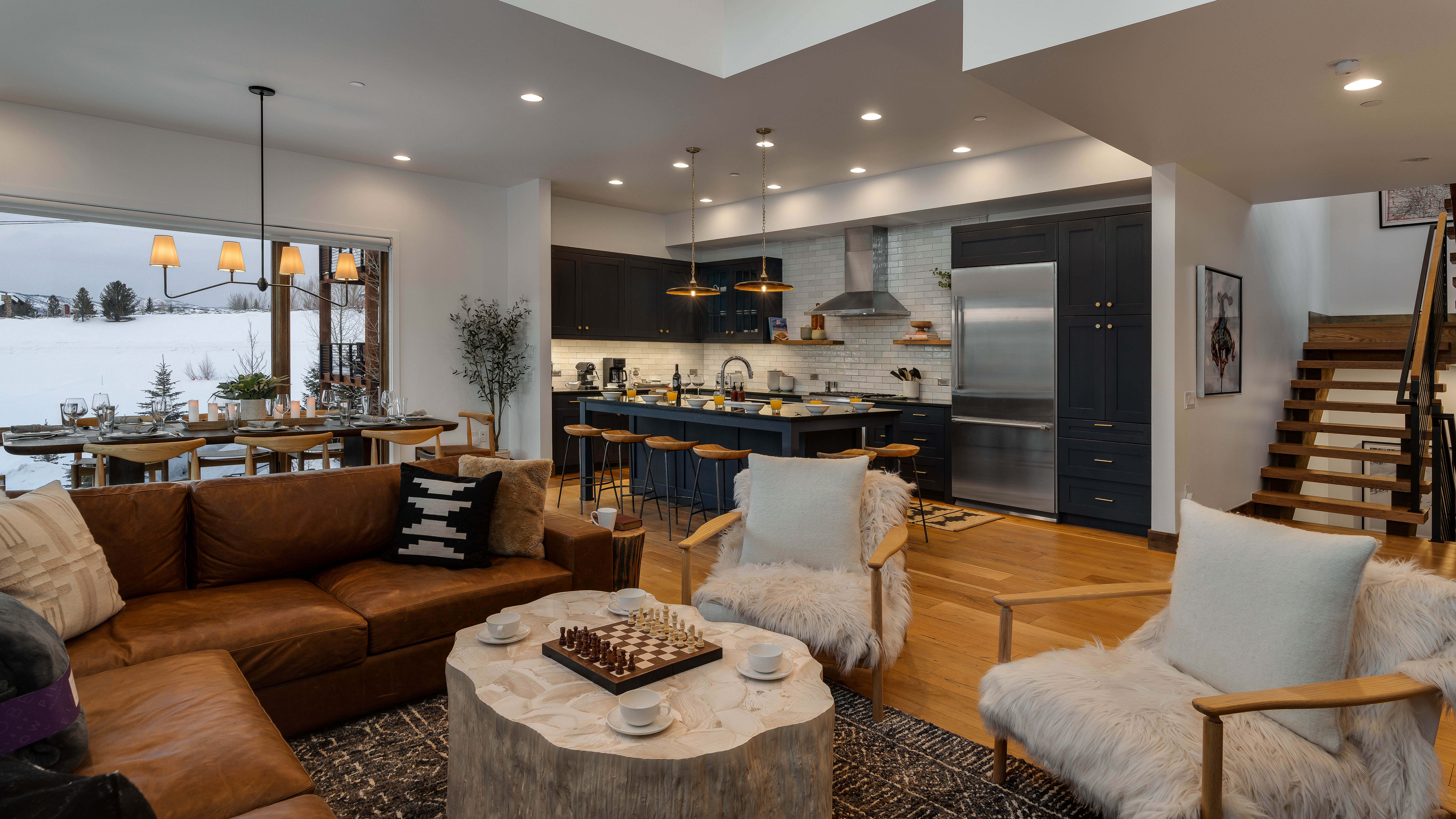 Great room looking into kitchen and dining area