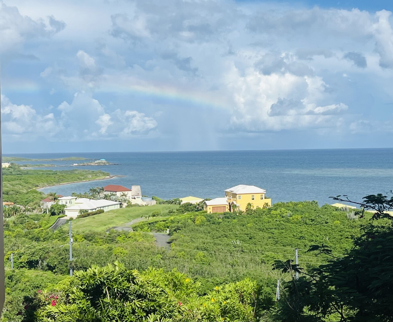 One of the many rainbows you will experience from the balcony of your Vacation Rental!