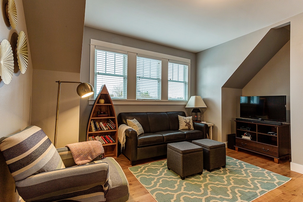 The entertainment room has a sofa sleeper, perfect for lounging or a restful sleep