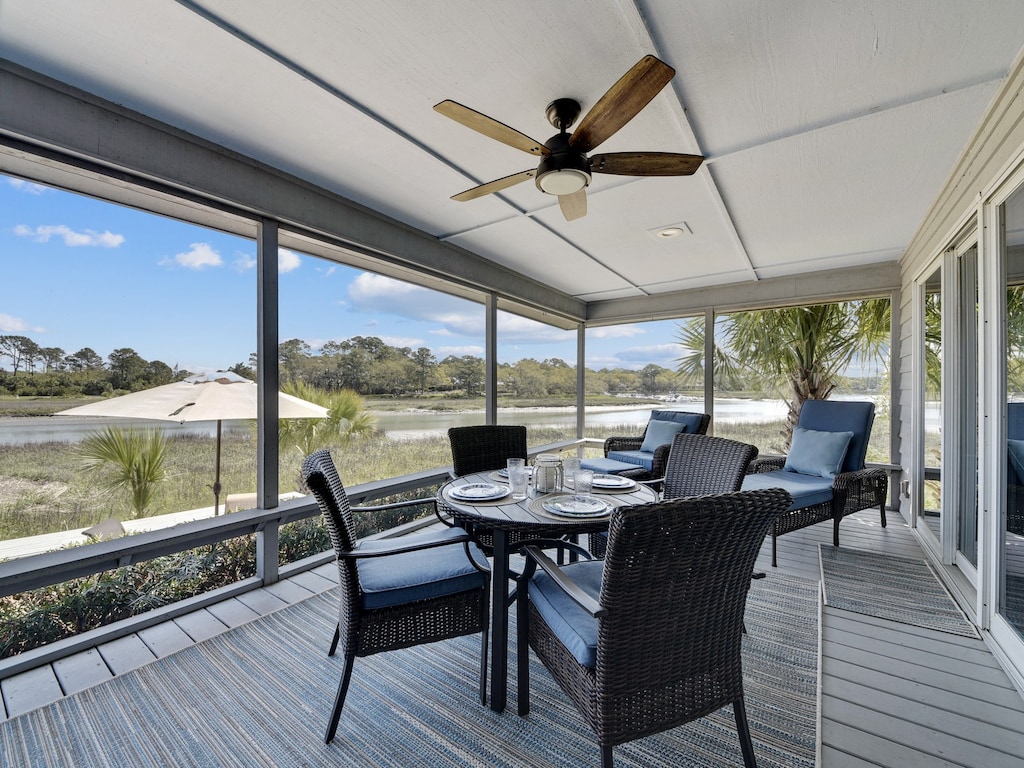 Enjoy Dining or Relaxing on the Peacfeul Screened Porch at 44 Lands End