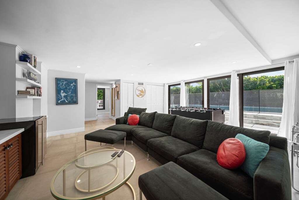 Lower level living area with access to pool deck