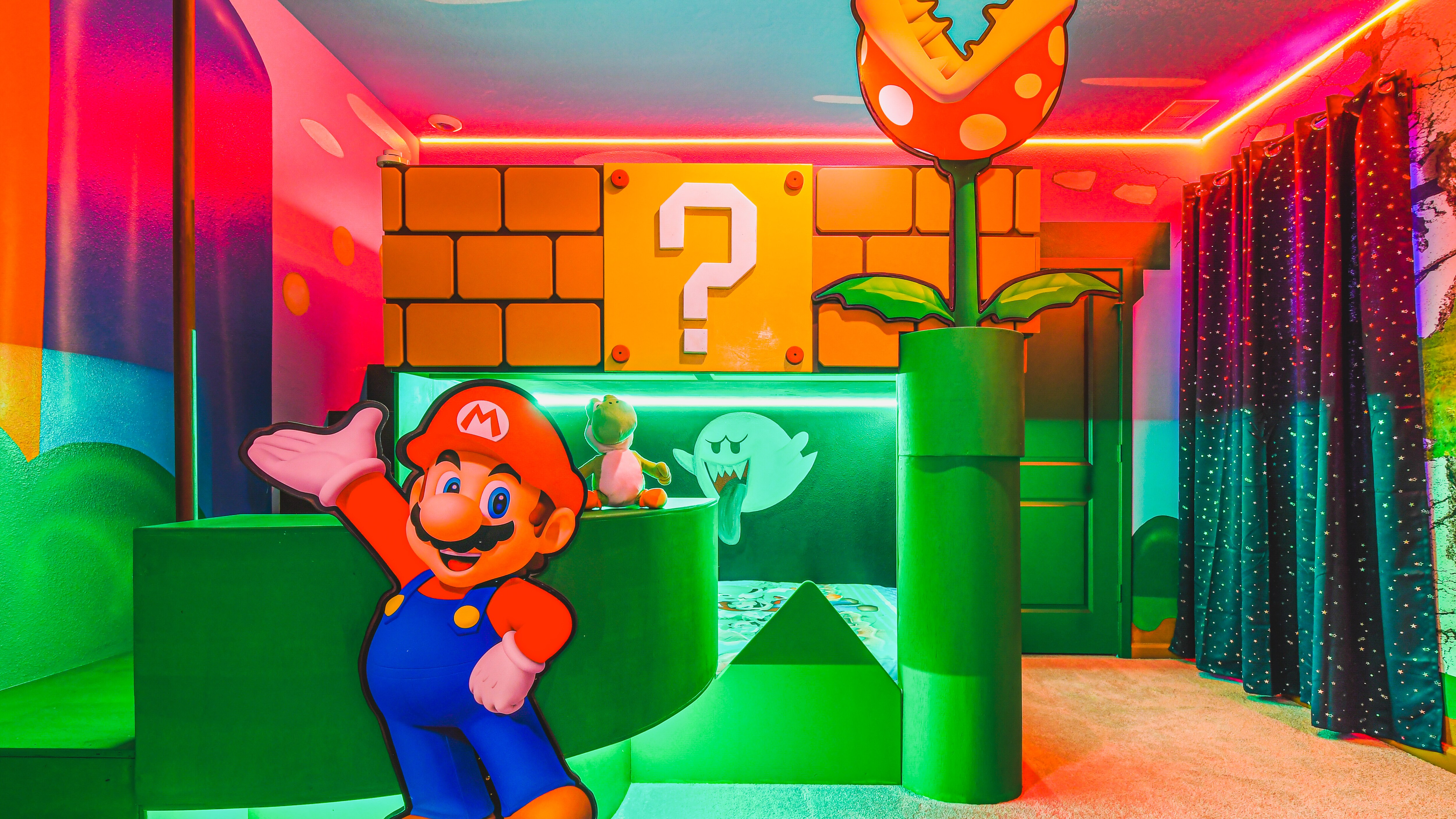 Experience the upstairs bedroom designed with a cool Mario theme.
