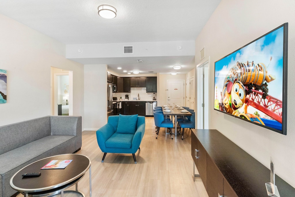 Relaxation Oasis: Sink into the sumptuous sofa, surrounded by stylish accents and warm hues, making this living room a true haven for relaxation