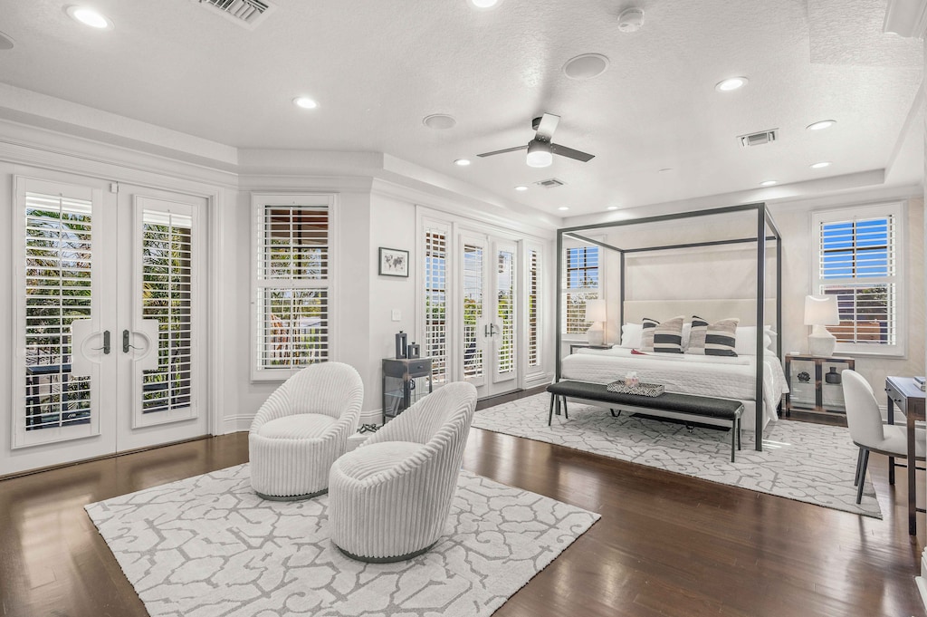 The primary bedroom features a private veranda, two walk-in closets, and a master bathroom with both a shower and bathtub.