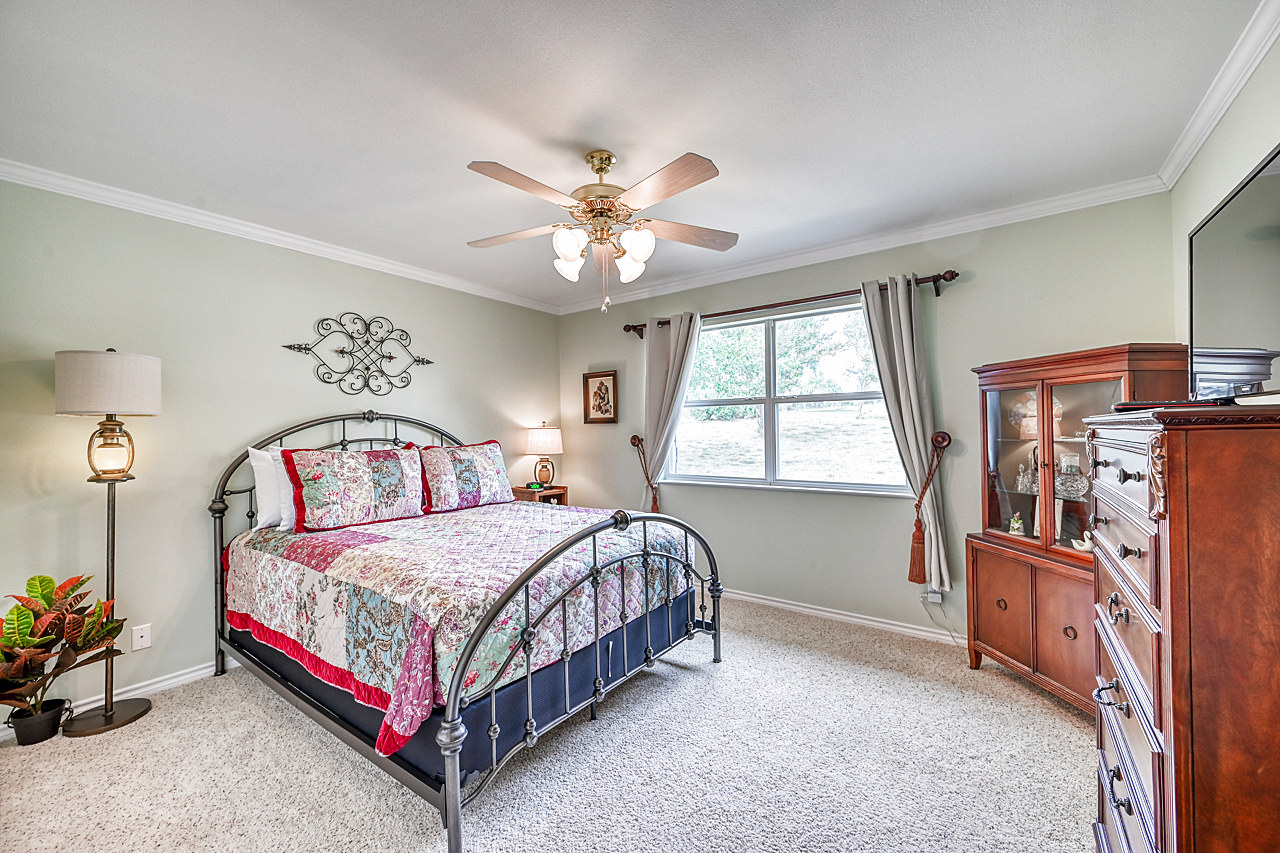 Third bedroom offers a queen bed with comfortable linens.