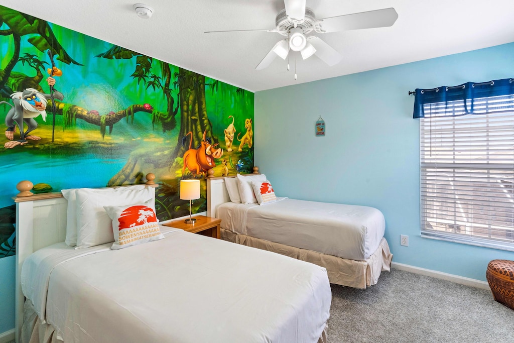 Experience the magic of Disney with our themed room, complete with two cozy single beds. - Stunning wardrobe with sufficient space - Enjoy the Availability of Smart Tv and Netflix - Indulge in mesmerizing views from the windows of the room