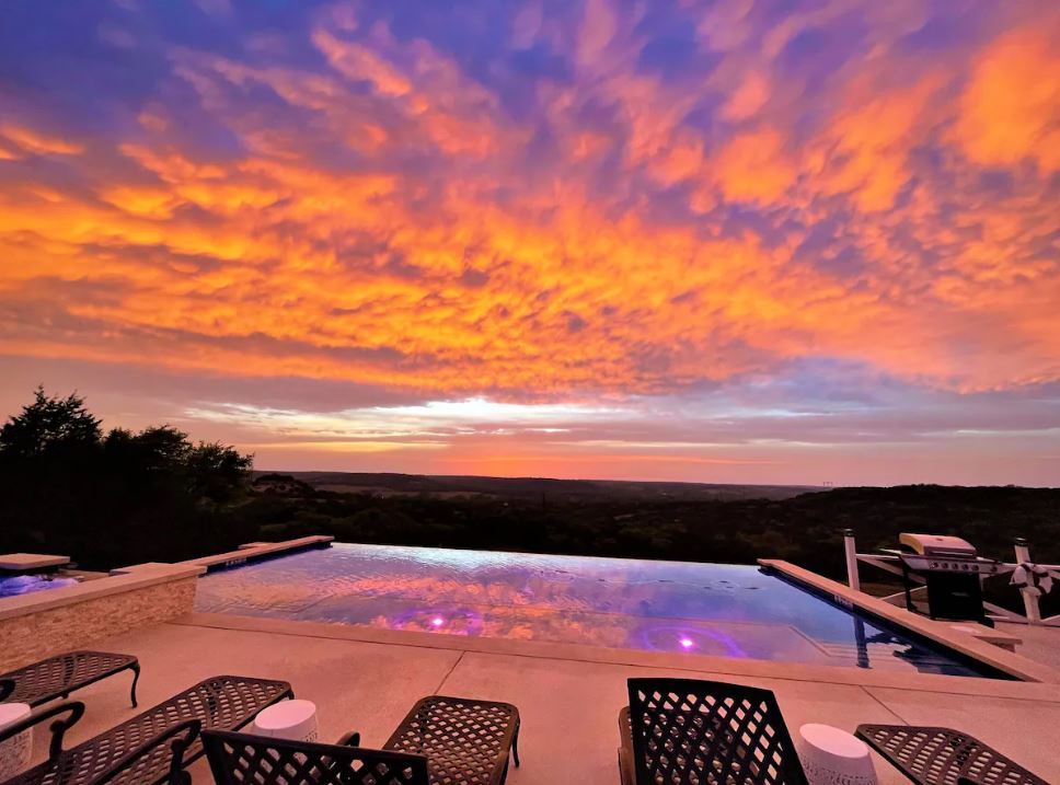 Welcome to the Hilltop Haus! Amazing Hill Country Views with Infinity Pool just two miles from main street!