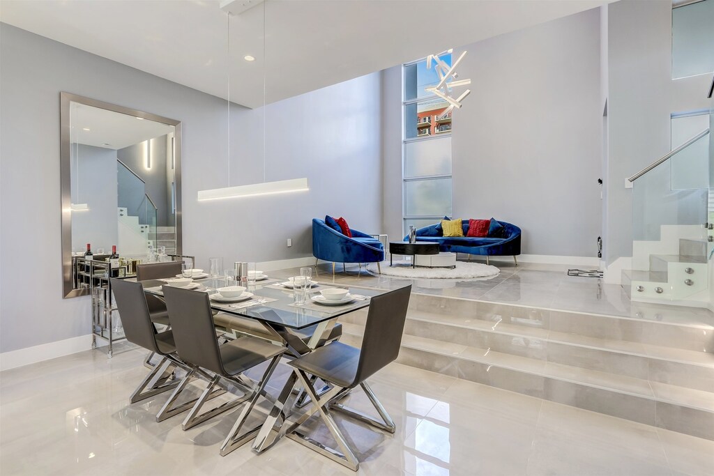 Modern dining table comfortably sits six