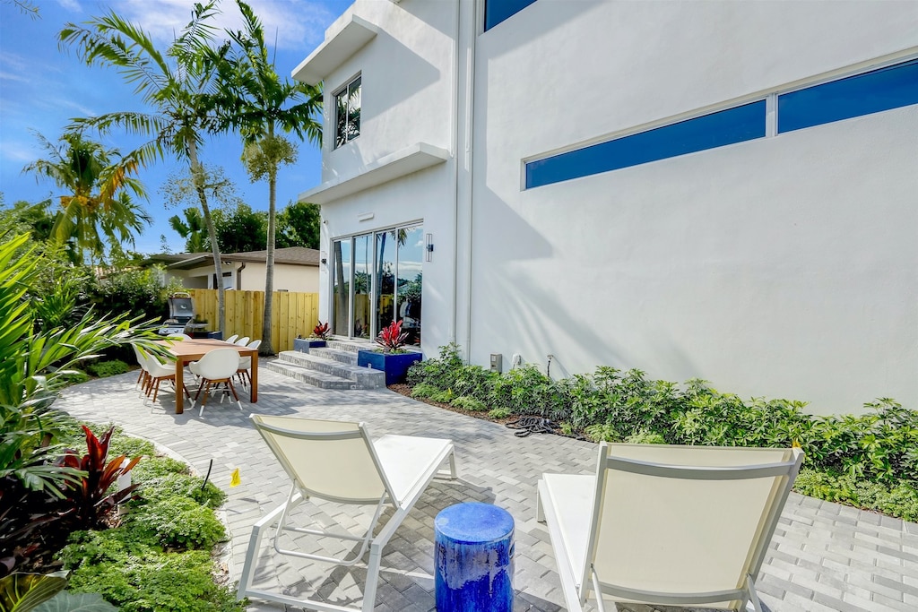 Patio lounge chairs curate the ideal unwinding space