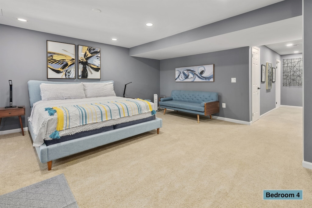 Master suite delivers a king sized mattress, perfect for couples -basement-