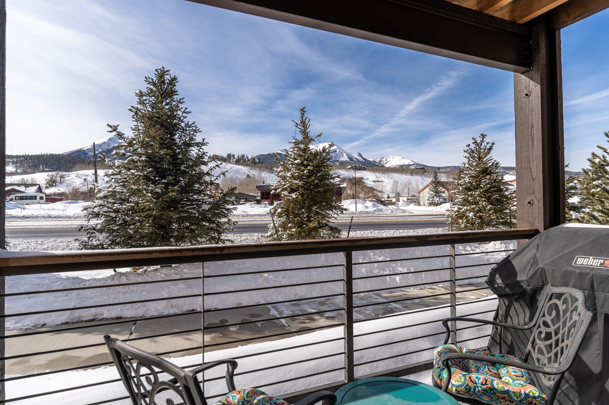 Balcony offering a gas grill, seating and views of Buffalo Mountain and Red Peak.