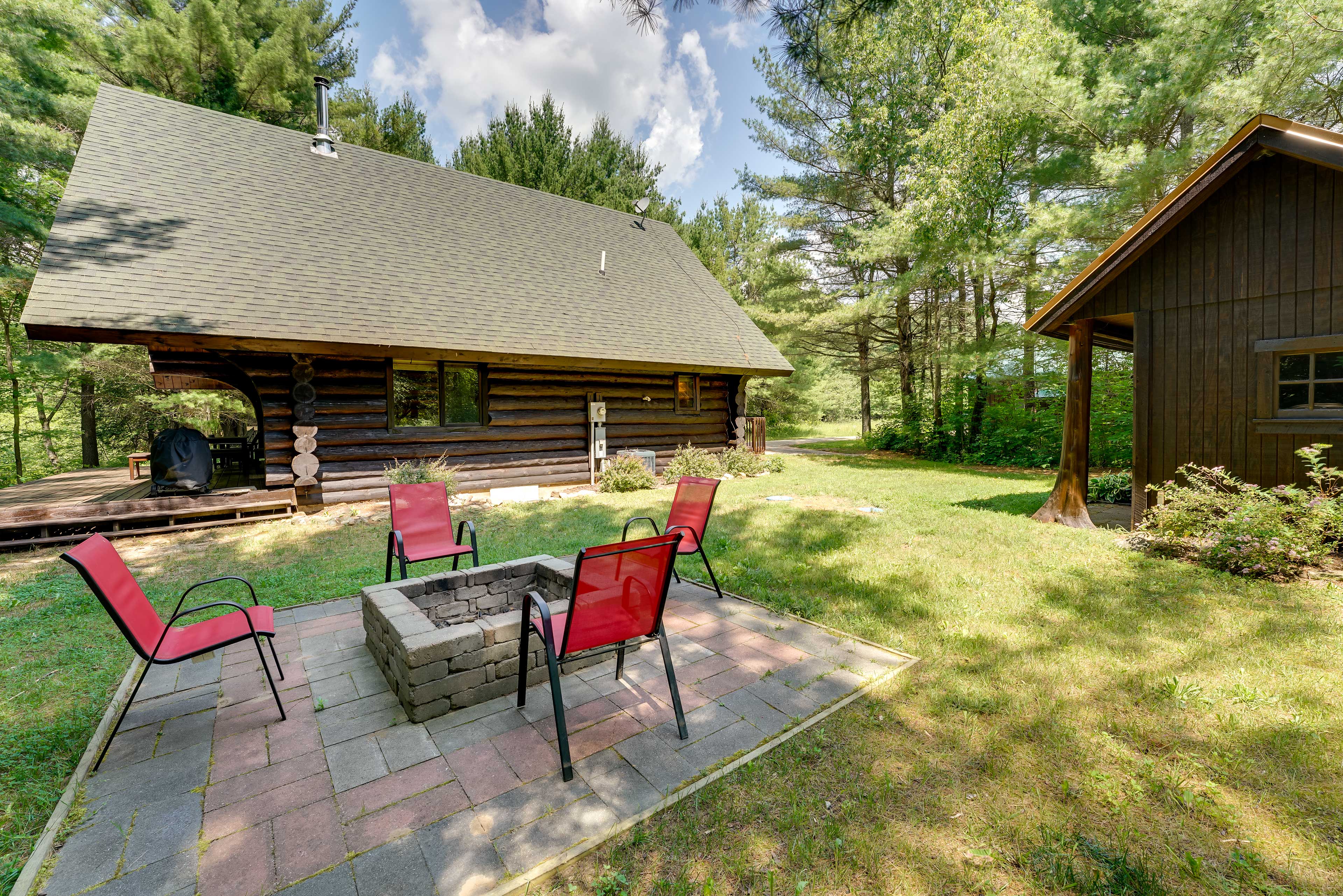 Property Image 2 - Secluded Log Cabin in NW Michigan: Hot Tub & Deck
