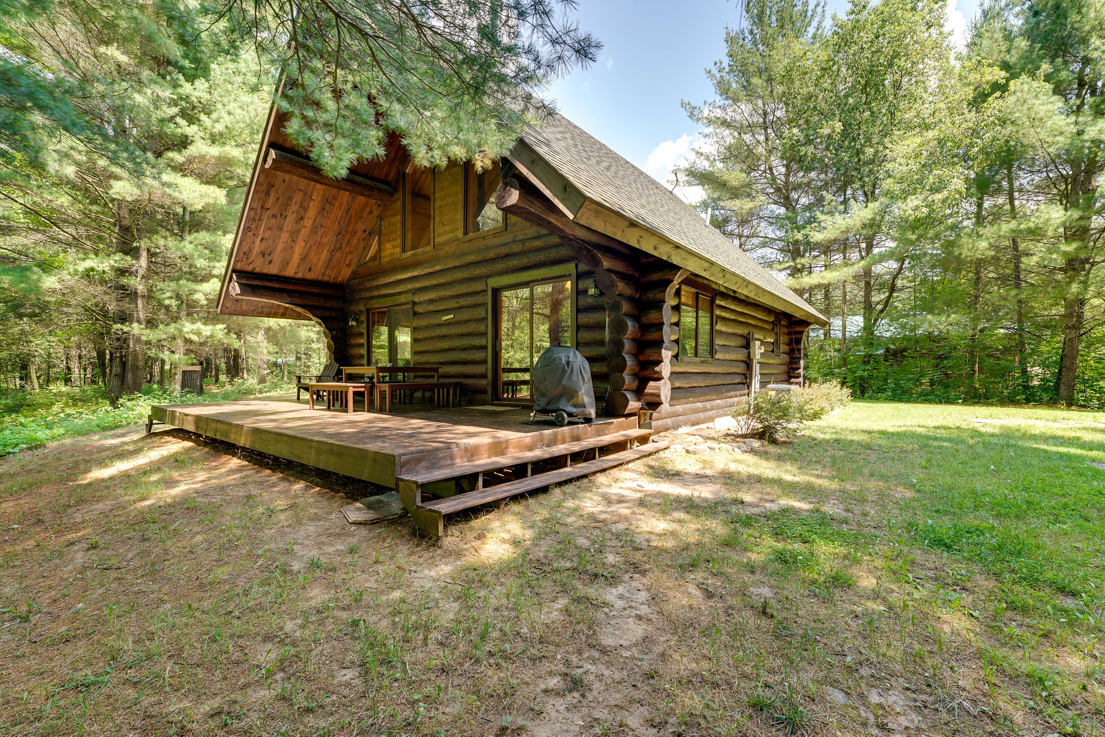 Property Image 1 - Secluded Log Cabin in NW Michigan: Fire Pit & Deck