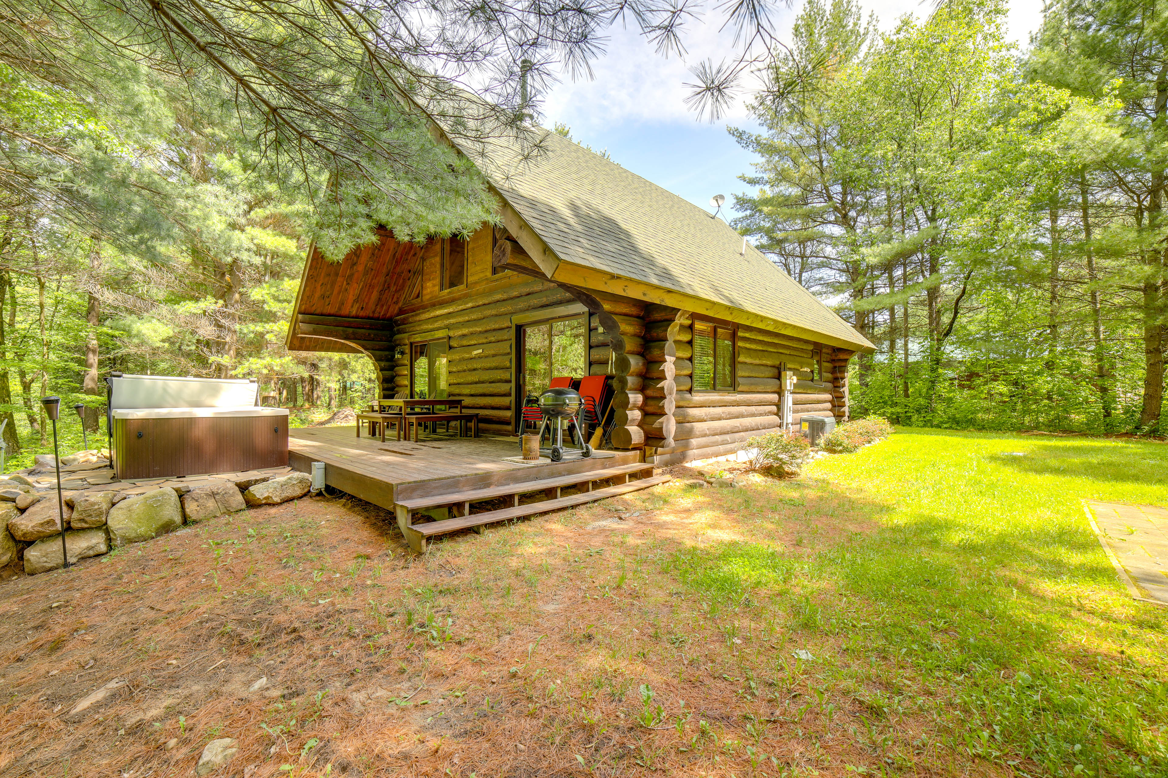 Property Image 1 - Secluded Log Cabin in NW Michigan: Hot Tub & Deck