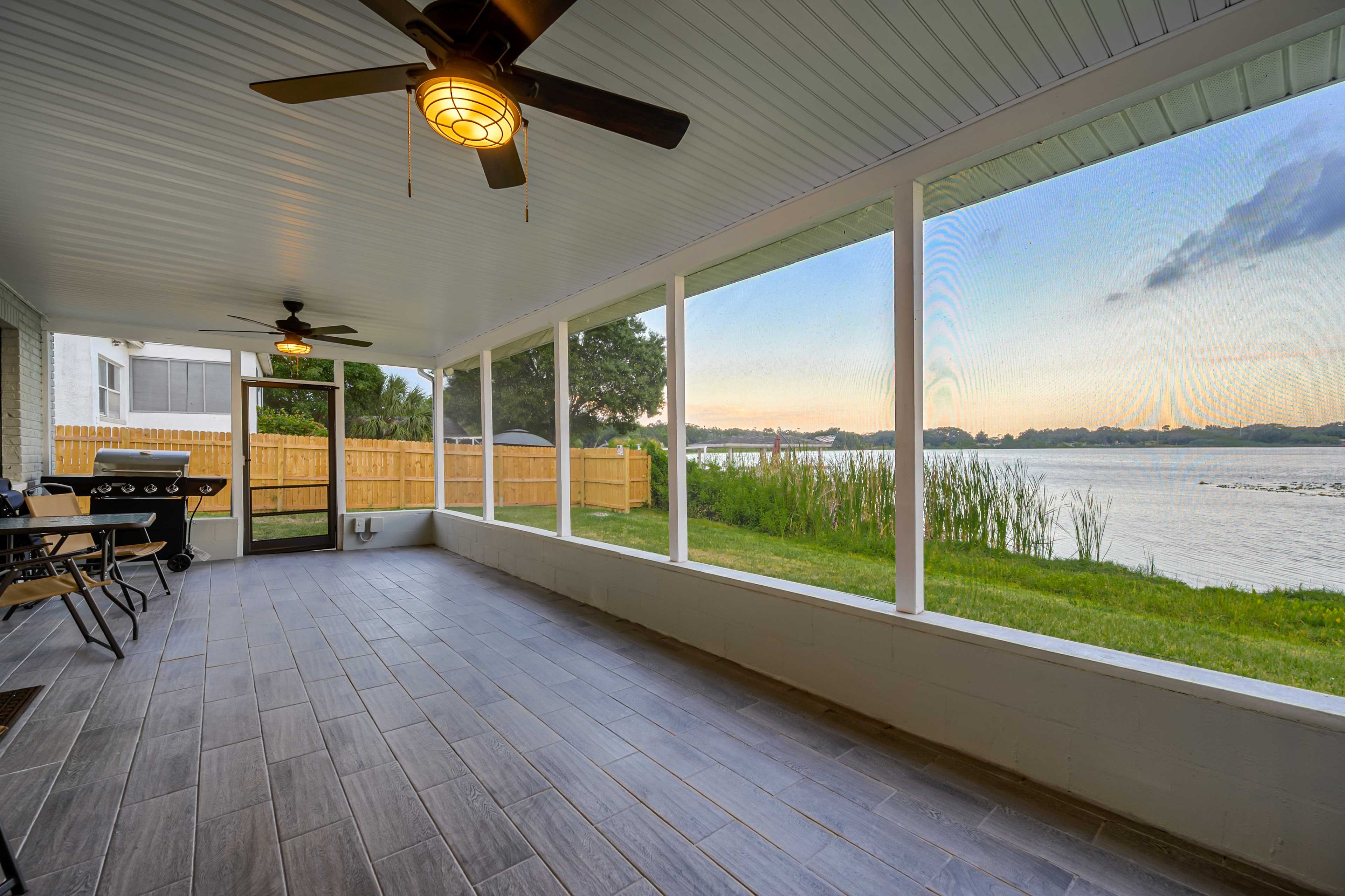 Property Image 2 - Lakefront Home w/ Screened Porch & Grill