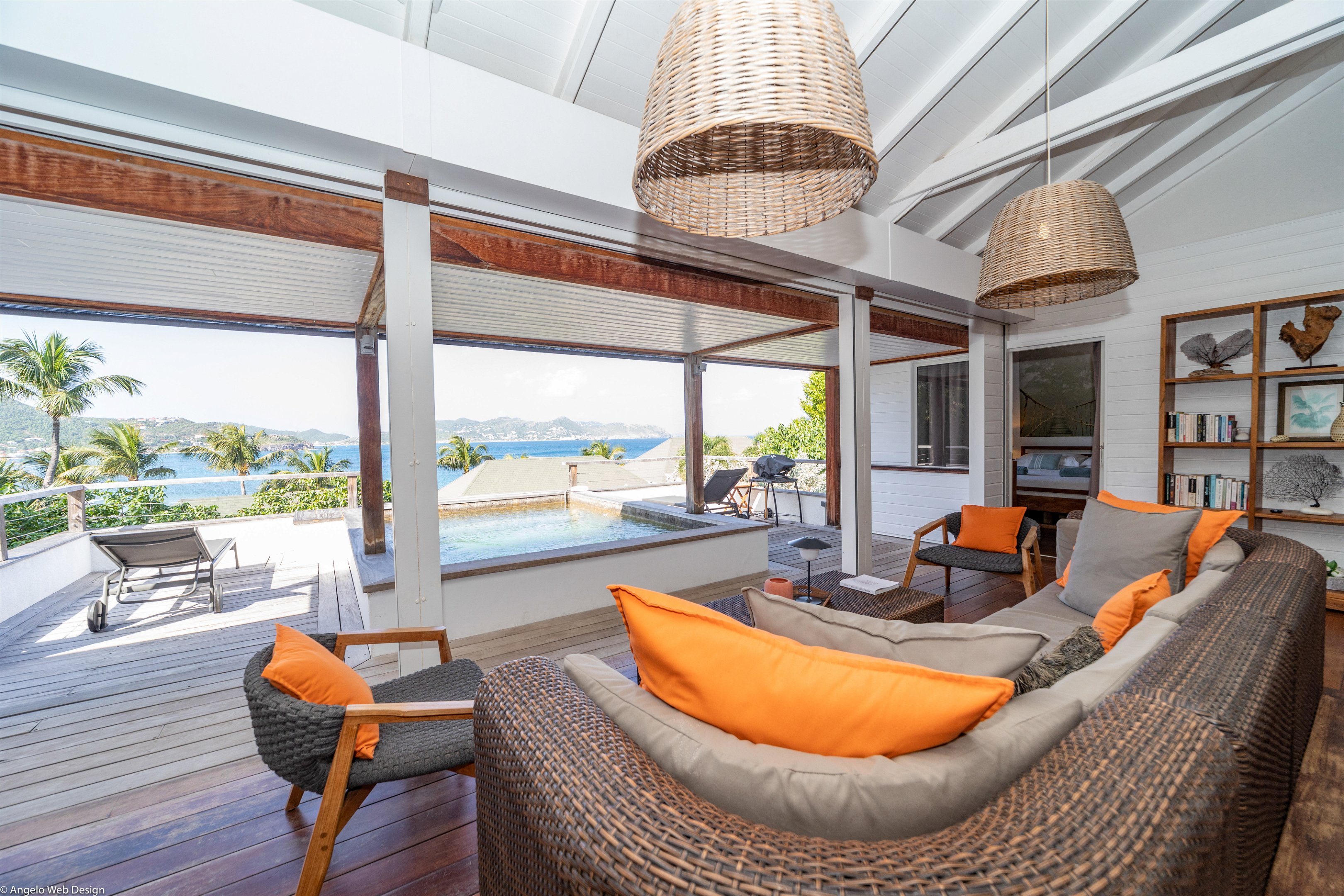 Lounge area in the great room, ceiling fan. 