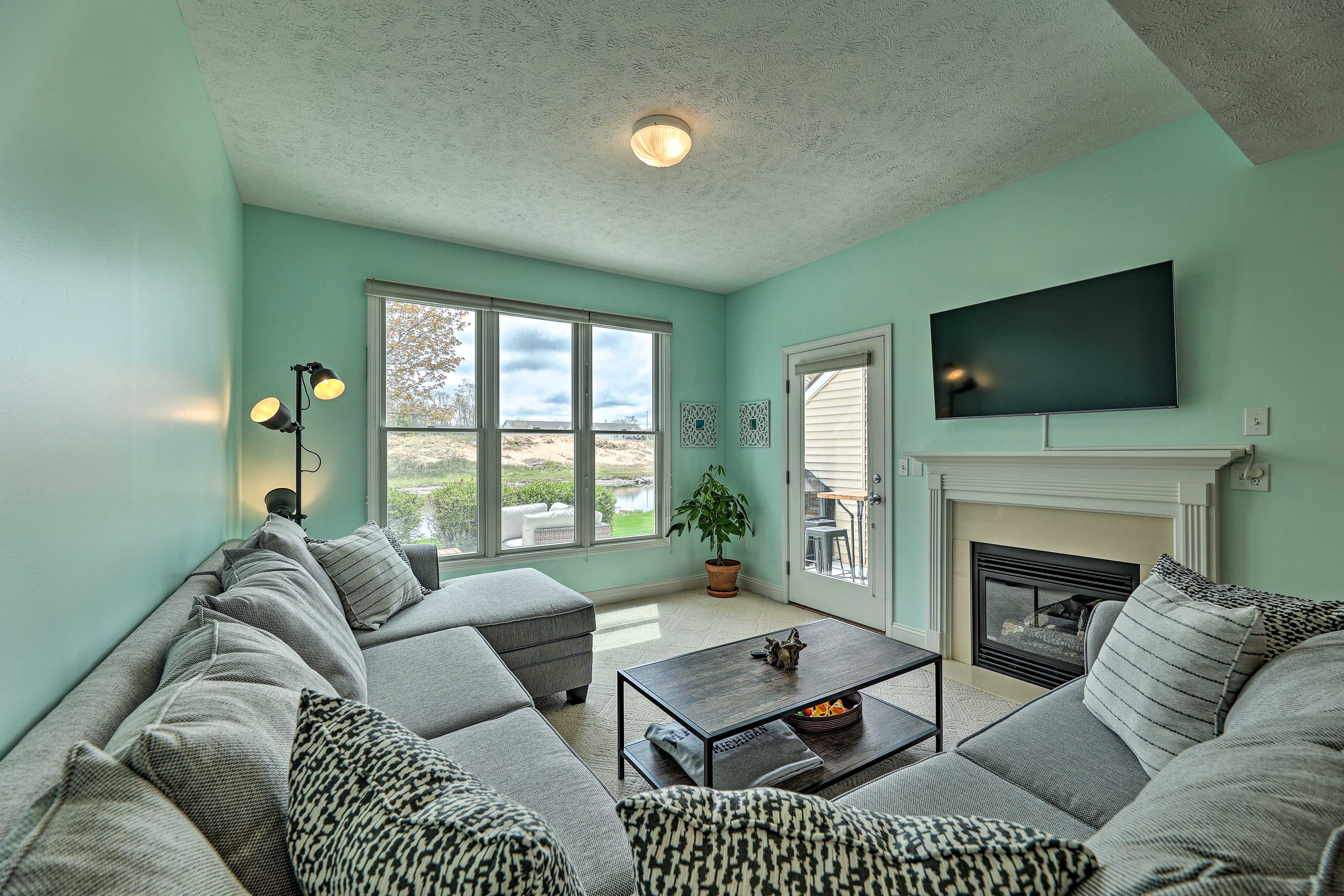 Property Image 1 - Bright Manistee Condo w/ Beach + Pool Access!