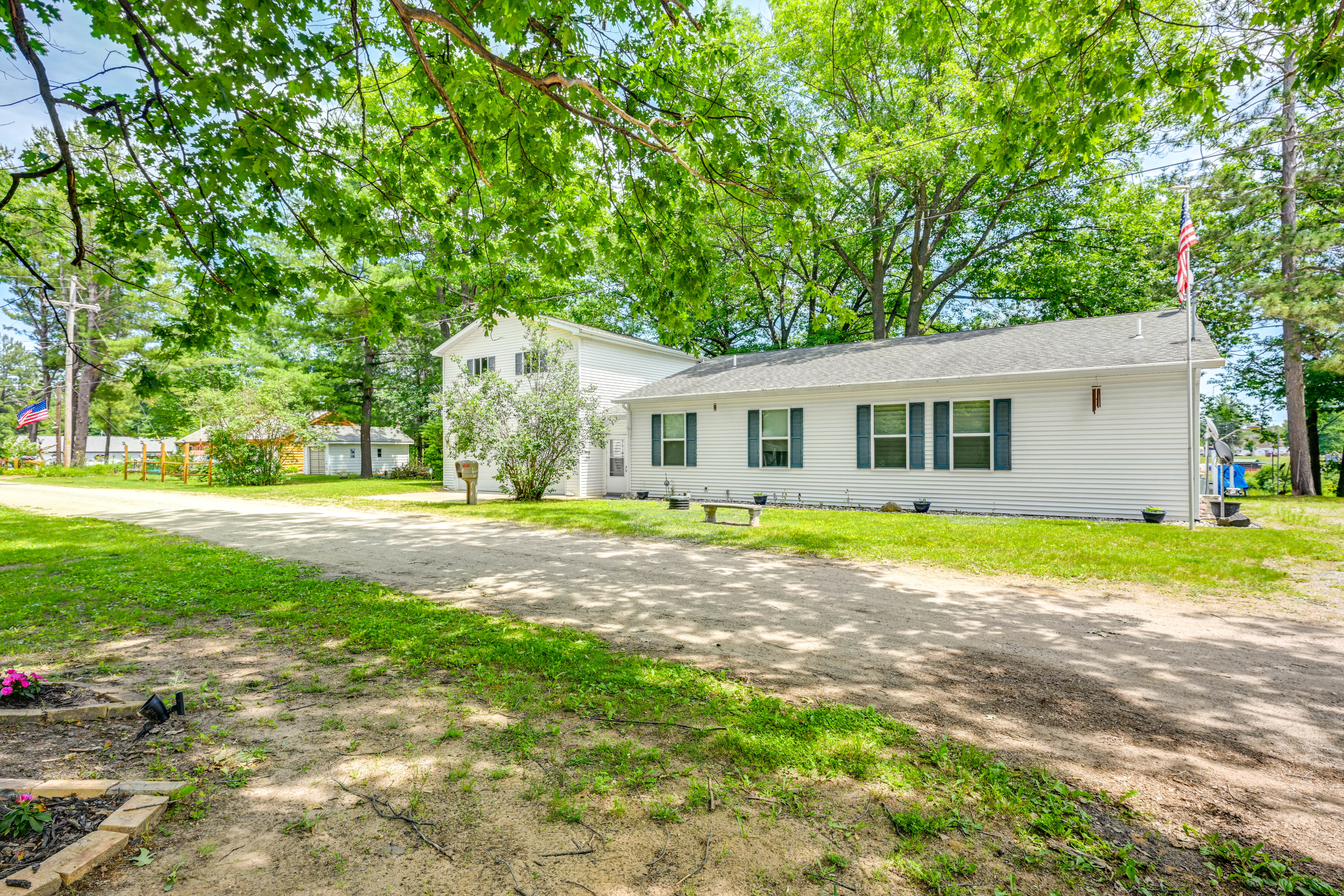 Property Image 2 - Waterfront Gladwin Home w/ Deck + Fire Pit!