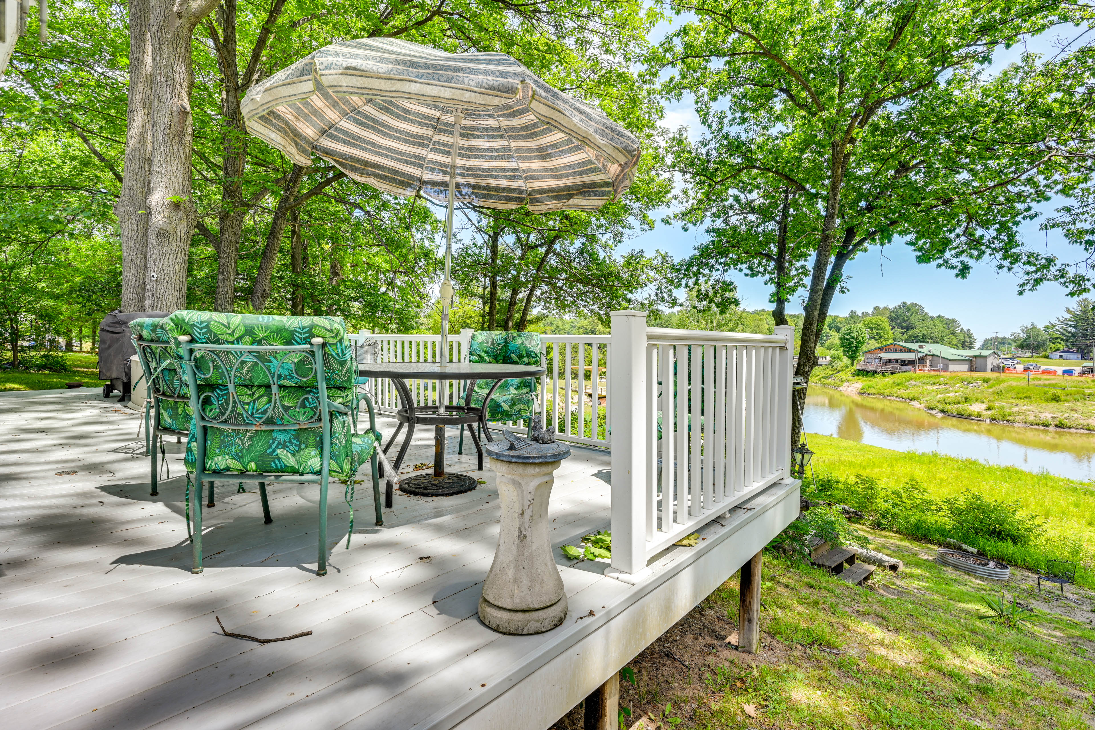 Property Image 1 - Waterfront Gladwin Home w/ Deck + Fire Pit!