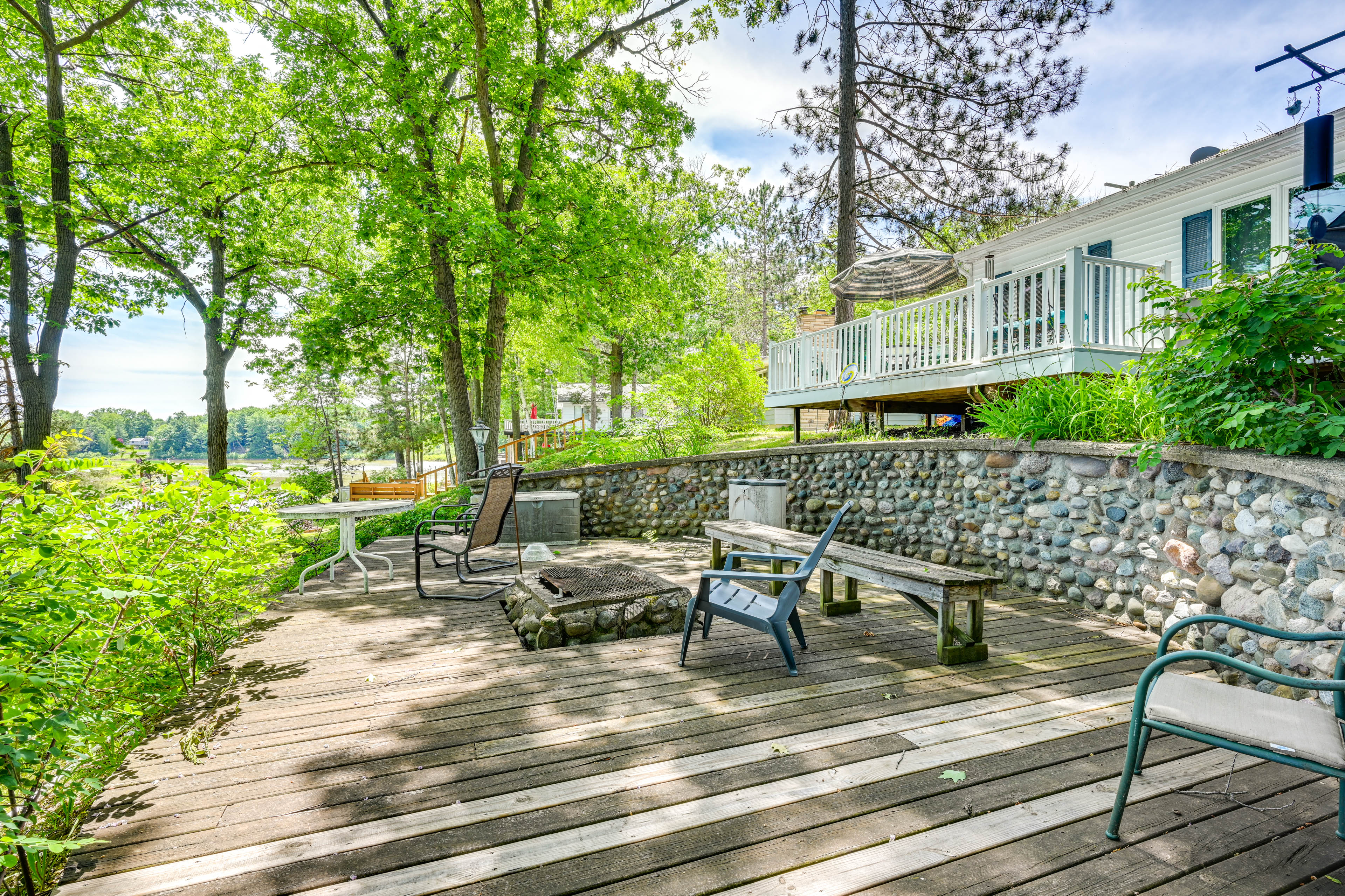 Property Image 2 - Waterfront Gladwin Home w/ Deck + Fire Pit!