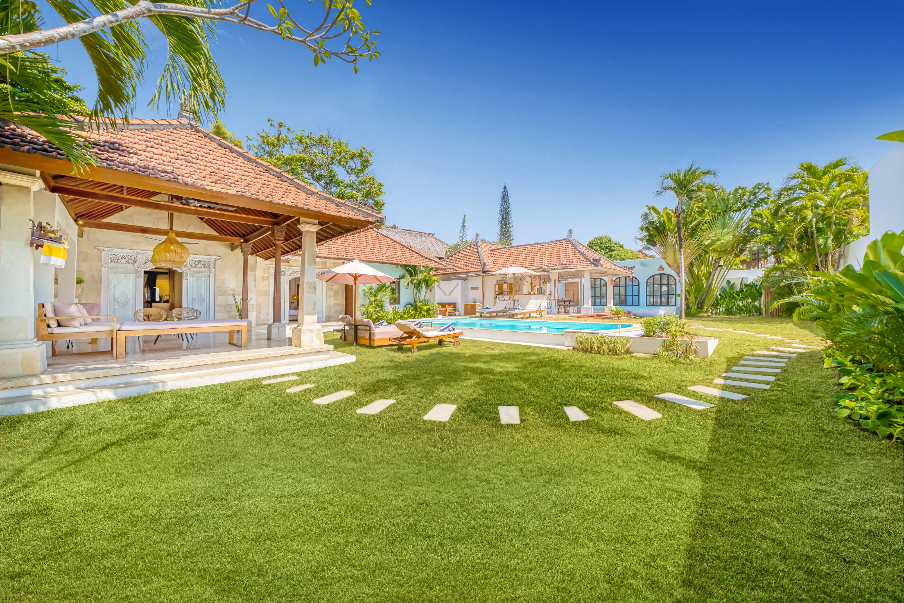 Spacious garden around the pool and the Villa