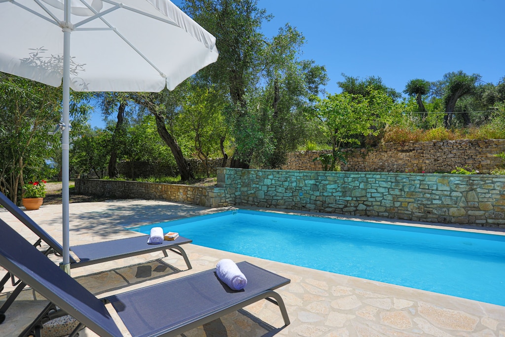 Sit back and relax in style around amazing private pool