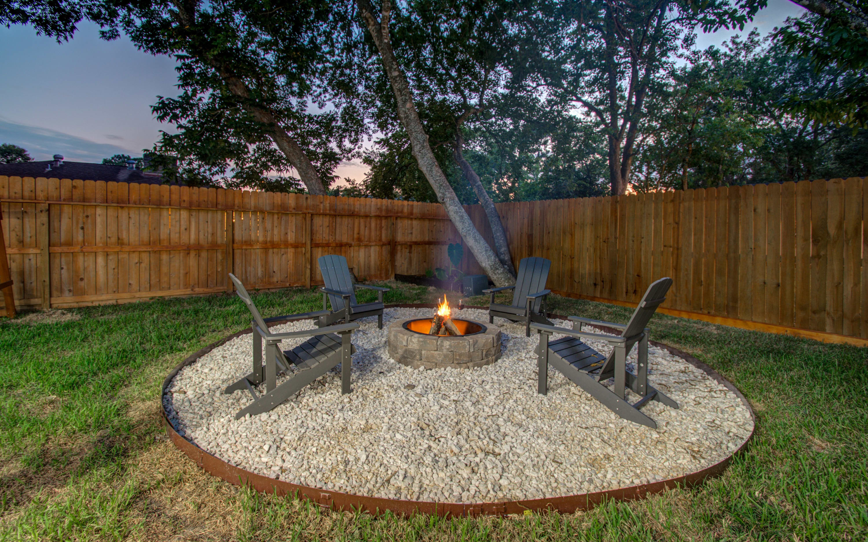 You can stay warm and cozy lounging around this fire pit as you continue your conversations late into the evening. 