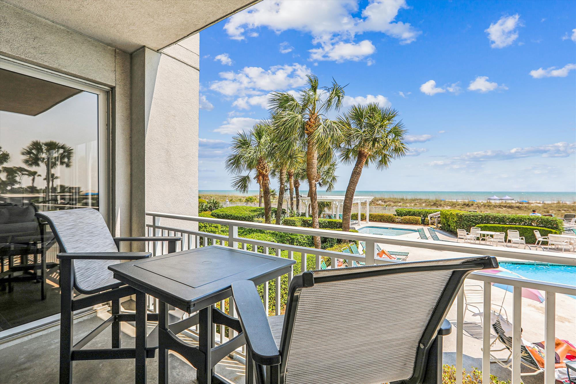 Main Balcony off Living Room Overlooking Pool and Beach at 3103 SeaCrest