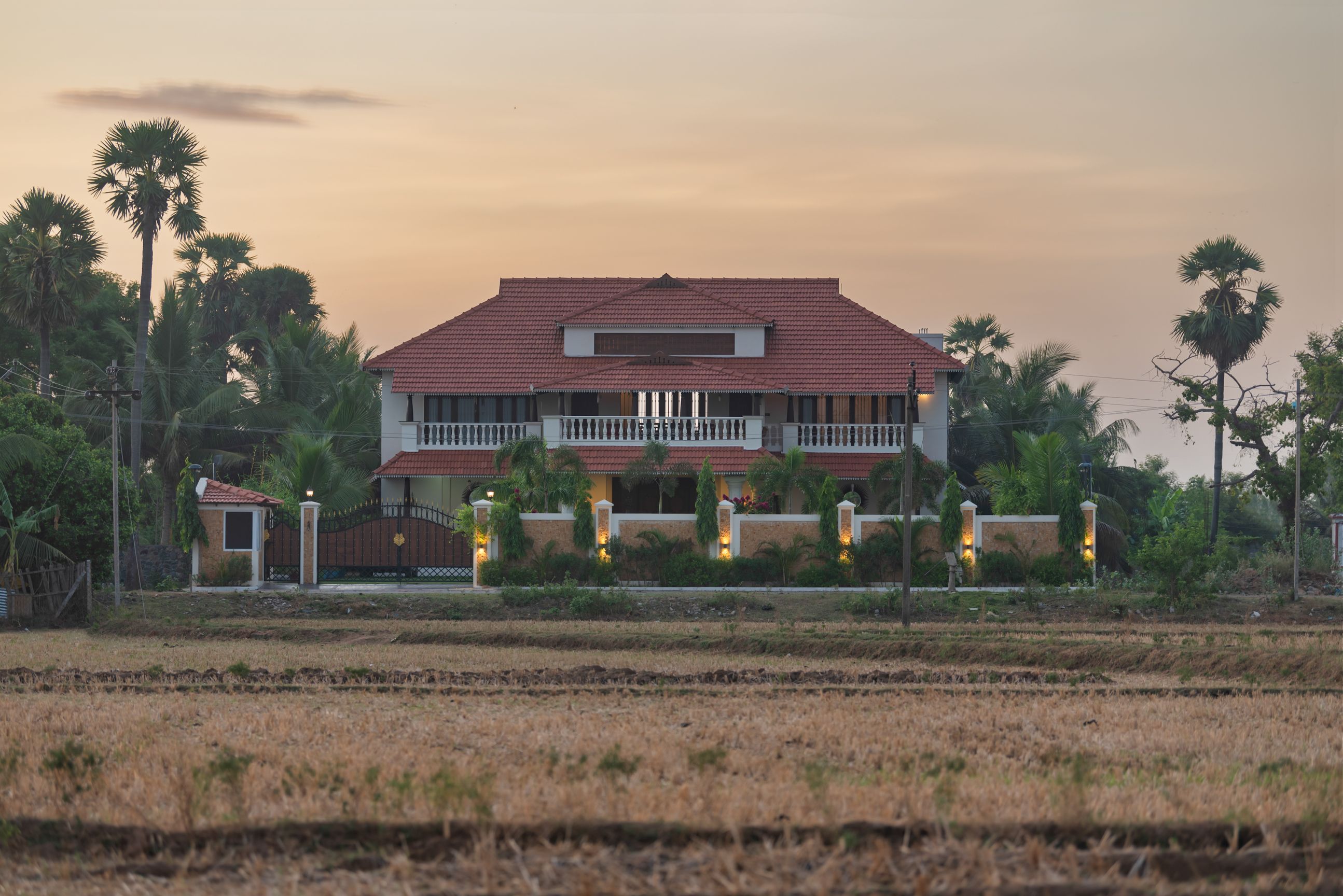 Long shot of the villa with Paddy Fields in the front