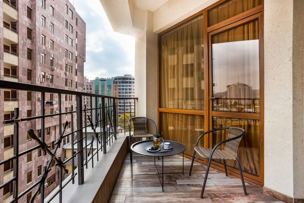 Cozy balcony with the city view