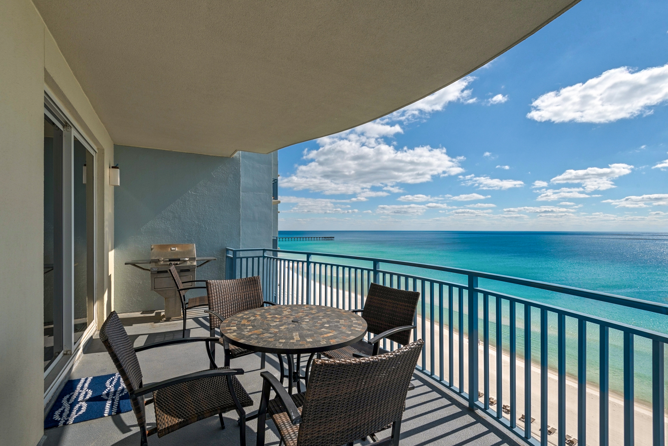 Enjoy a meal on this large balcony with grill!