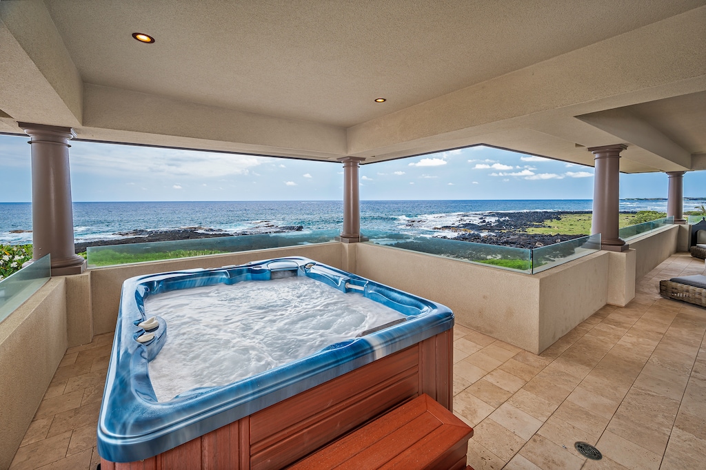 This Luxury Oceanfront Estate is the most northern home in this gated community offering the only completely unobstructed northern coastline view