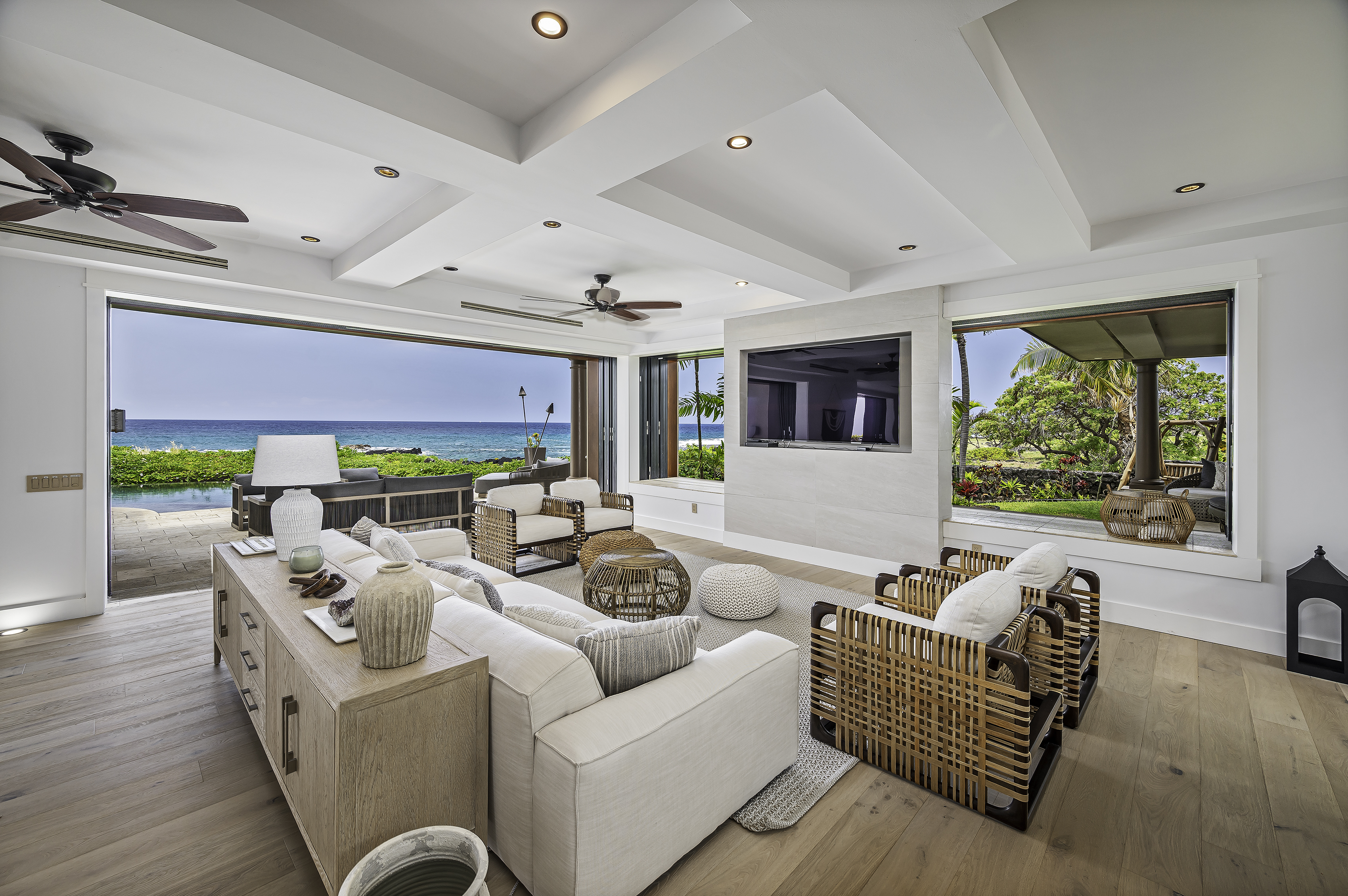Alohi Kai Estate (Shining Sea) was artisan designed to offer you 180 degrees of ocean front shoreline, while relaxing in 7,000+ square feet of elegant living space