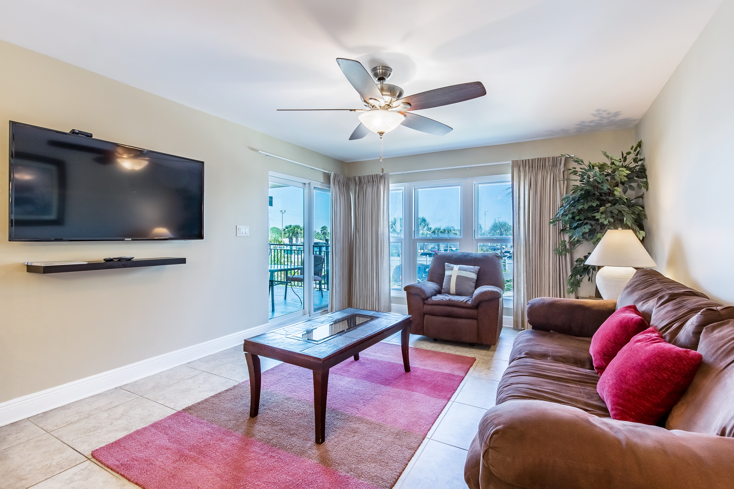 Living space w/porch access and flat screen TV