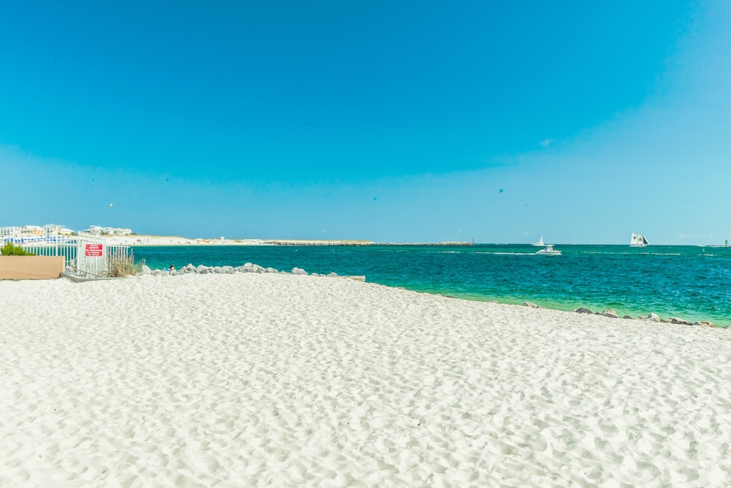 Gorgeous beach just steps away! Built on Seawall